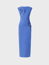 A sophisticated cornflower blue column dress by Talitha, highlighted by a plunging neckline for a chic appearance.
