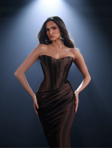  Elegant chocolate gown with one-shoulder neckline, fitted bodice, floor-length skirt, and high leg split for graceful movement.
