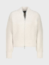 Cozy almond-colored plush cardigan jacket, designed for comfort and style, suitable for various casual occasions.