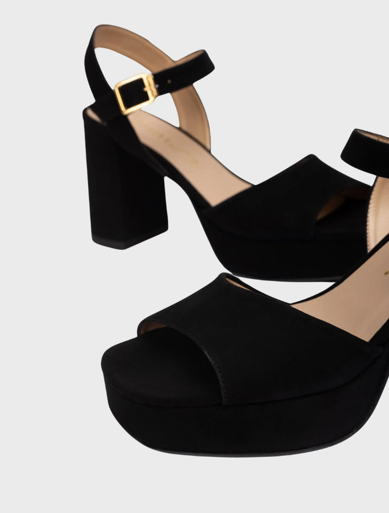 Stylish black suede platform sandals featuring a gold buckle and a wide heel, made from Kid Suede-Cranberry leather.