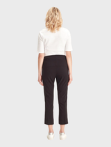 Stylish black Acrobat Eyelet 7/8 pants shown flat, emphasizing their unique eyelet design and tailored fit.