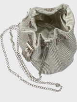 Small silver leather bucket bag with a tassel on the handle, named Sylvie Crystal Pouch.
