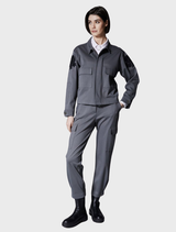 Sage cuff cargo trousers featuring multiple pockets and a relaxed fit, ideal for casual or outdoor wear.