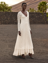 Long off-white jacquard lace dress with V-neck, long sleeves, and gathered flounce hem, perfect for summer ceremonies.