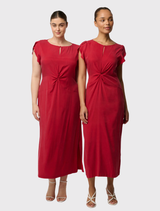 Elegant Geneva midi dress in dahlia red, with a twist-front neckline, flowing sleeves, and side splits for comfort.