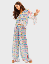 Dahlia blouse showcases multicolor chevrons and floral prints, with "Music Is My Love" embroidery and elegant bell sleeves.