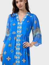 Dambulla Midi Dress in Azure Multi, featuring custom embroidery, gathered side hem, and a matching tie belt.