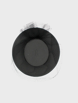 Danika Racewear's black boater hat, designed with a wide brim for sun protection and a chic outdoor accessory.