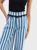 Featuring a trendy stripe design, the powder denim Darcey Jean offers a contemporary look for various occasions.
