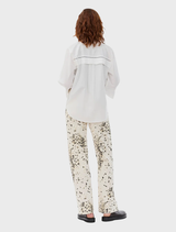UlianaMD dash dot printed jeans in cotton denim, showcasing straight legs, concealed zip, and pockets, worn by a 175 cm model.