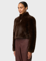 Walnut-colored faux fur cropped jacket, designed for a chic look while providing comfort and warmth during chilly days.