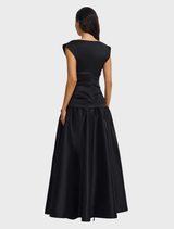 Black Delph Maxi Dress showcasing a chic, floor-length style ideal for both casual and formal wear.