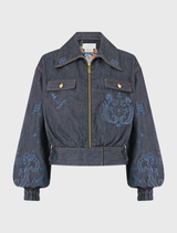 Aanika denim bomber jacket with pockets, zip front, ribbed cuffs, and crystal embellishments for versatile styling.