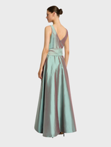 Chic mint gown with a graceful silhouette, perfect for formal events, showcasing elegant details and a refined aesthetic.