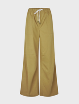 Relaxed brown wide trousers with spacious side pockets and a drawstring waist for a modern, adjustable fit.