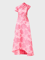 Pink floral asymmetrical maxi gown displayed on a mannequin, showcasing its elegant design and vibrant colors.