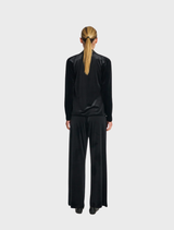 Black drape top with a relaxed fit, perfect for layering or standalone wear.