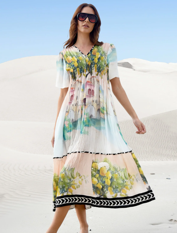 Elegant pink dress with a paint splatter design, perfect for formal occasions and stylish events.