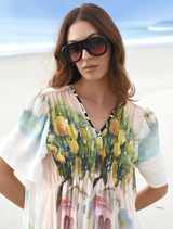 Stylish pink dress adorned with a creative paint design, suitable for impressing at parties or special events.