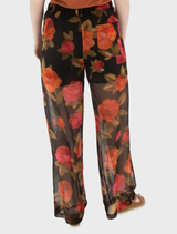 Close-up of brown dual trousers, focusing on the fabric and design elements.