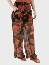 Brown dual trousers on a neutral background, illustrating their cut and style.