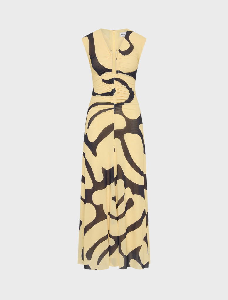 Dune Midi Dress featuring a striking yellow and black print design, showcasing a stylish and modern aesthetic.