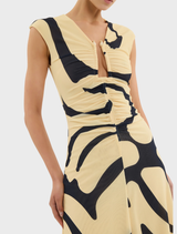Dune Midi Dress in a unique yellow and black design, combining elegance with contemporary fashion trends.
