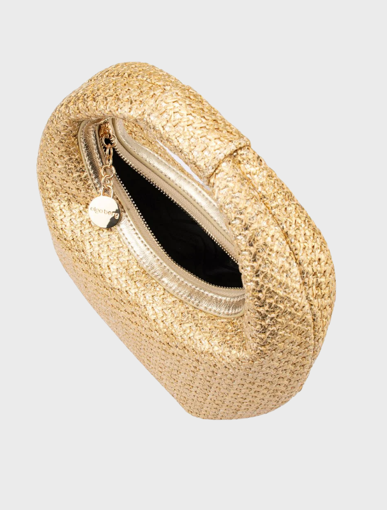Elegant gold hobo bag crafted from woven fabric, featuring a unique texture and sophisticated appearance.