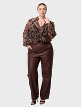 Joan Leather's oxblood straight leg pants, showcasing an elasticated waist for added comfort and style.