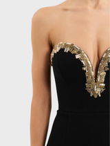 Elegant black Alexandrite gown with a flowing silhouette and intricate detailing.