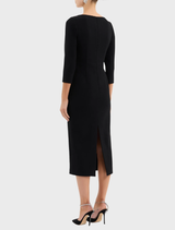 Classic black long-sleeve midi dress, combining comfort and style for a chic wardrobe staple.