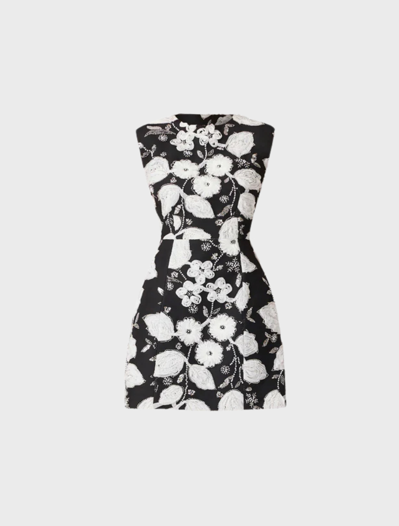 Floral dress in black and white, crafted to resemble a flower with detailed patterns and a flowing silhouette.