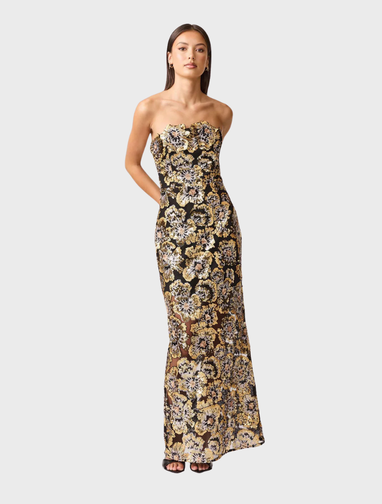 Celeste gown in black and gold, featuring a chic design and elegant draping, suitable for formal gatherings.