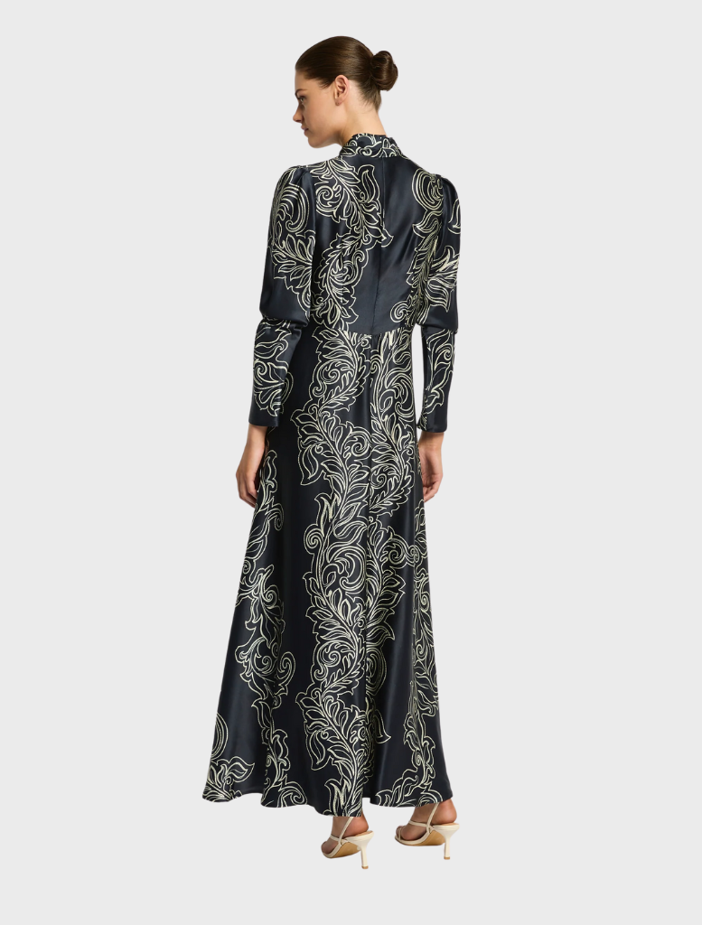 Dark ink and cream maxi dress with long sleeves, perfect for a formal event or a casual outing.