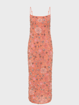 Elegant peach Francesca flower gown hanging, showcasing intricate floral details and a soft, flowing design.