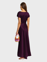 A stylish maxi dress in deep fig hue, showcasing a comfortable fit and graceful draping.