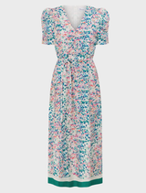 A sophisticated Glimmer Dress in marble, highlighting a refined design and luxurious fabric for an elegant ensemble.