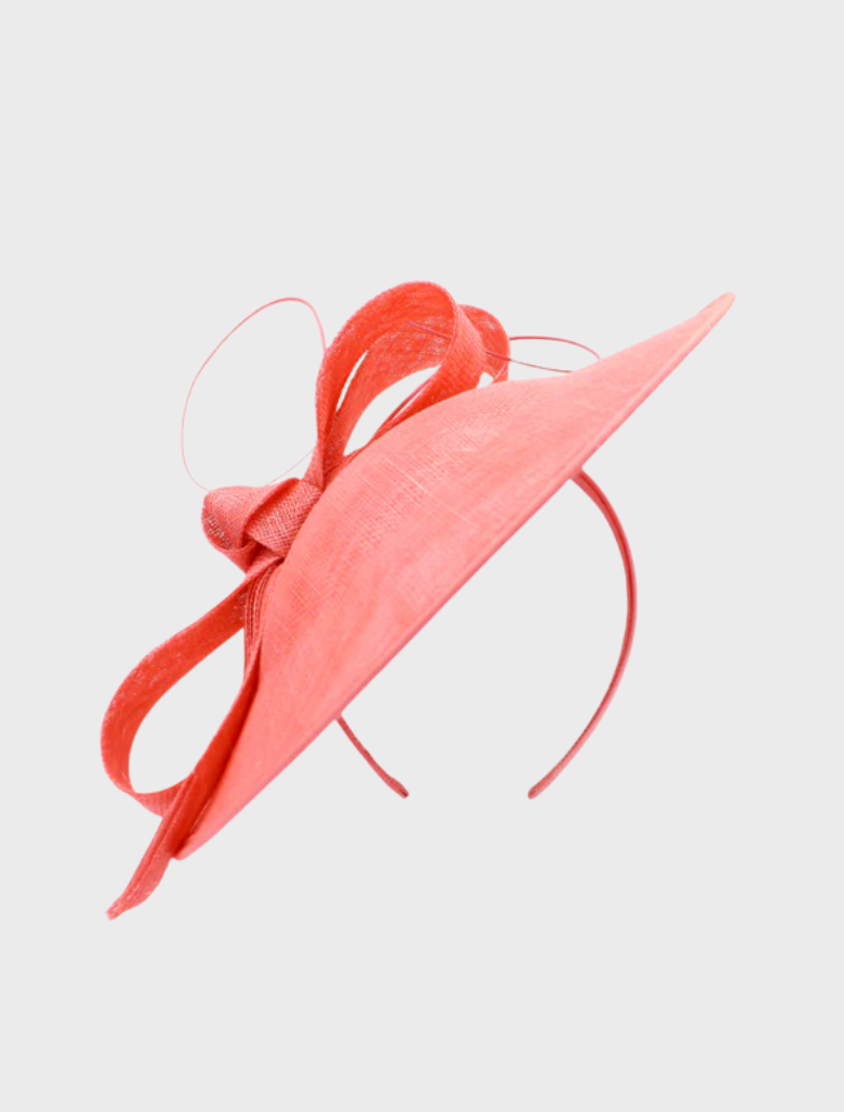 Stylish pink Haisley fascinator showcasing floral elements, designed to complement formal outfits beautifully.