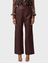 Oxblood straight leg pants by Joan Leather, equipped with an elasticated waist for ease of wear.