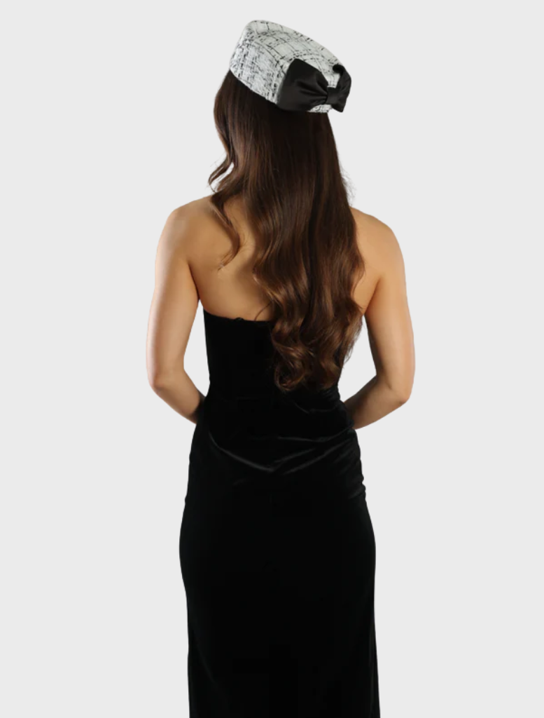 Stylish white Pillbox Hat from Kennedy Racewear, designed to enhance race day fashion with its elegant silhouette.