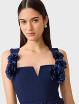 A deep navy sleeveless jumpsuit from Leonara, designed with a chic fit and flowing wide-leg style for elegance.