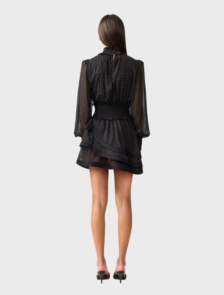 Chic black Moss Mini Dress designed with a modern cut, perfect for dressing up or down for any occasion.