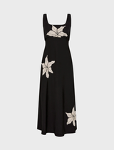 Nikita Midi dress in black, designed with a chic silhouette, perfect for a sophisticated look at any event.