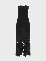 Sophisticated ebony maxi dress with an intricate appliqué bustier, designed for a fashionable look.