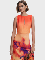 A dress displaying a striking orange and blue pattern, combining elegance and flair.
