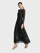 Elegant emerald and black A-line dress, showcasing a flattering silhouette perfect for formal events.