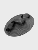 Black fascinator with a unique design, showcasing feathers and netting, suitable for weddings or upscale gatherings.