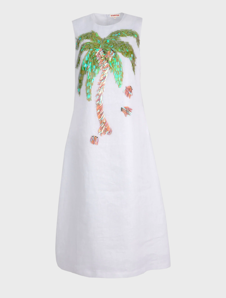 Stylish white Trump Card Dress designed for elegance, perfect for parties and formal celebrations.