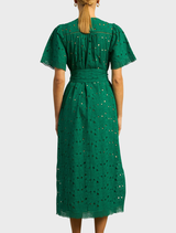 Voyage Dress in deep emerald, offering a stylish and elegant look for formal events and celebrations.