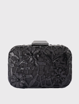 Black ELENA Appliquéd Clutch with sequins, removable shoulder chain, clasp closure, and gunmetal-tone hardware.